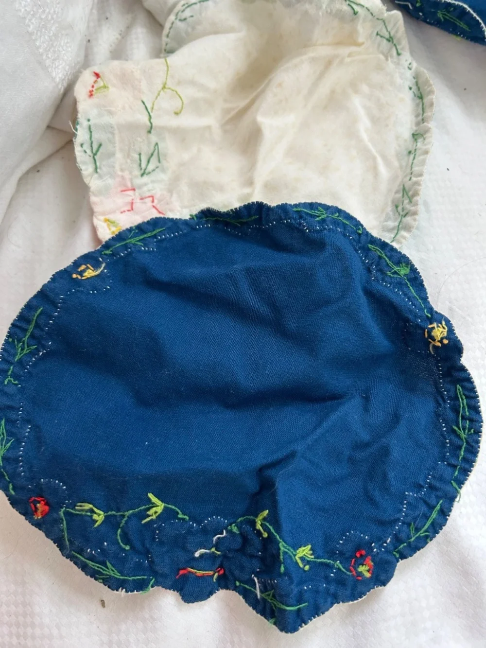 Antique St Barth handmade embroidered applique set 8 blue white doilies center